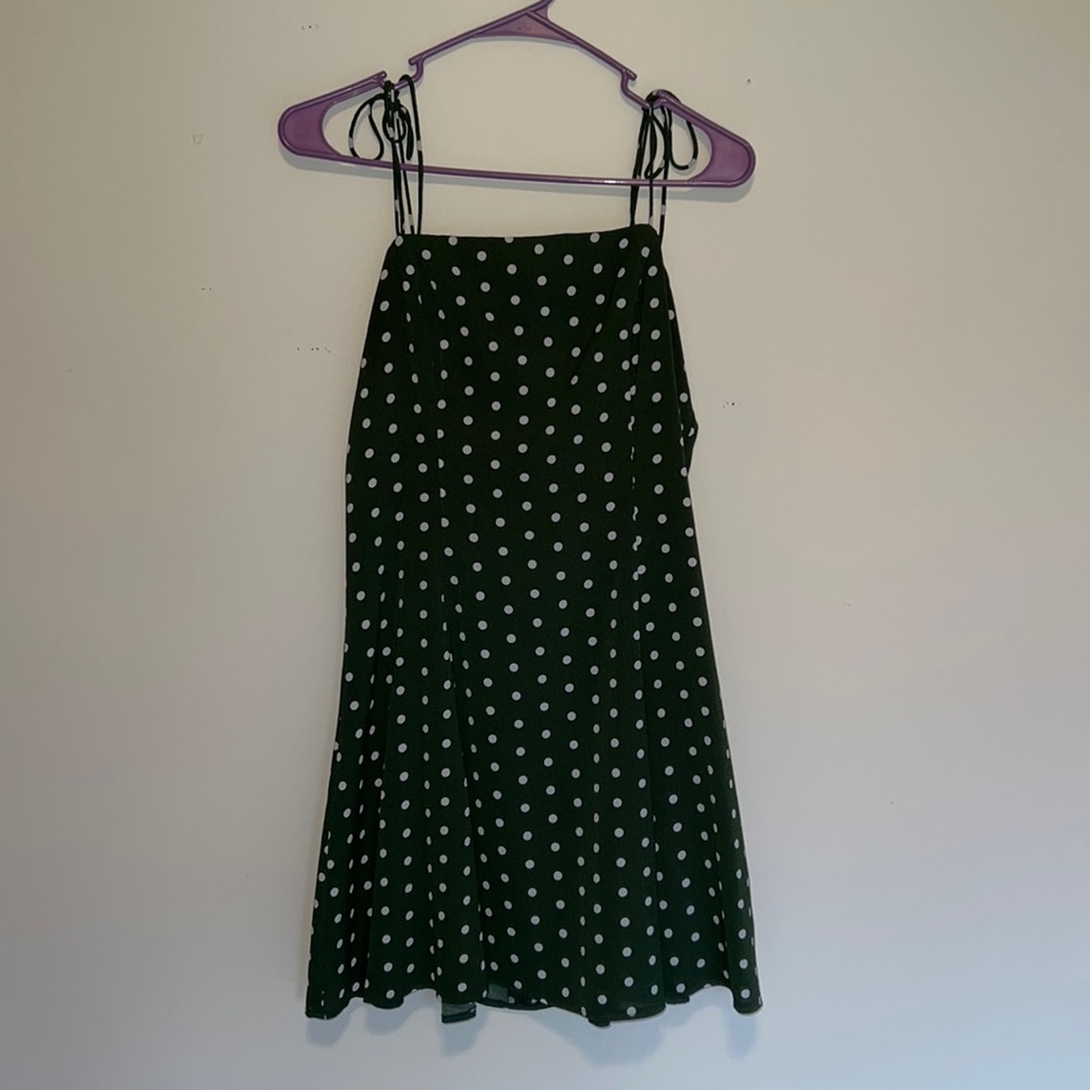 Green and white polka dot dress